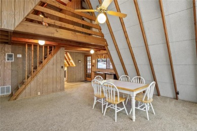 Nestled on a serene 2-acre lot at, this delightful A-frame home on Innsbrook Resort Golf Course in Missouri - for sale on GolfHomes.com, golf home, golf lot