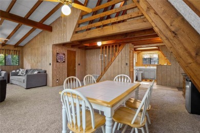 Nestled on a serene 2-acre lot at, this delightful A-frame home on Innsbrook Resort Golf Course in Missouri - for sale on GolfHomes.com, golf home, golf lot