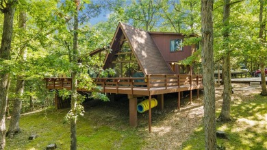 Nestled on a serene 2-acre lot at, this delightful A-frame home on Innsbrook Resort Golf Course in Missouri - for sale on GolfHomes.com, golf home, golf lot