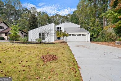 Welcome to this beautifully updated 4-bedroom home perfectly on Canongate At Flat Creek Club in Georgia - for sale on GolfHomes.com, golf home, golf lot