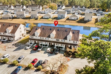 This first-floor 1-bedroom, 1.5 bath condo in Fairwood Lakes at on Heron Point Golf Club in South Carolina - for sale on GolfHomes.com, golf home, golf lot