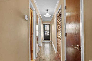 This first-floor 1-bedroom, 1.5 bath condo in Fairwood Lakes at on Heron Point Golf Club in South Carolina - for sale on GolfHomes.com, golf home, golf lot