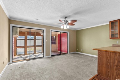 This first-floor 1-bedroom, 1.5 bath condo in Fairwood Lakes at on Heron Point Golf Club in South Carolina - for sale on GolfHomes.com, golf home, golf lot