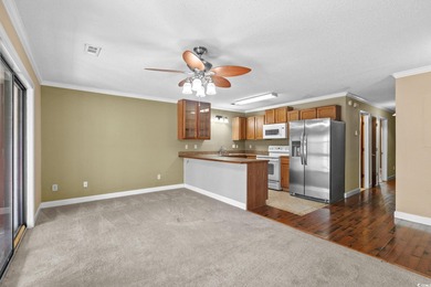 This first-floor 1-bedroom, 1.5 bath condo in Fairwood Lakes at on Heron Point Golf Club in South Carolina - for sale on GolfHomes.com, golf home, golf lot