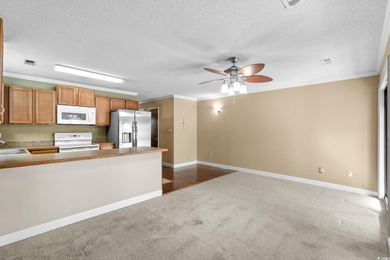 This first-floor 1-bedroom, 1.5 bath condo in Fairwood Lakes at on Heron Point Golf Club in South Carolina - for sale on GolfHomes.com, golf home, golf lot