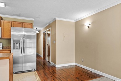 This first-floor 1-bedroom, 1.5 bath condo in Fairwood Lakes at on Heron Point Golf Club in South Carolina - for sale on GolfHomes.com, golf home, golf lot