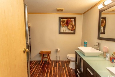 Charming 3-bedroom, 2-bath renovated home just a golf-cart ride on Prestwick Country Club in South Carolina - for sale on GolfHomes.com, golf home, golf lot