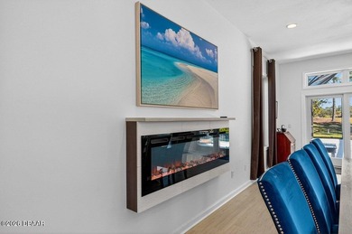 Stunning contemporary architecture frames the wide open interior on Plantation Bay Golf and Country Club in Florida - for sale on GolfHomes.com, golf home, golf lot