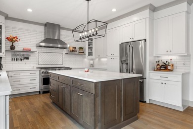 Designed from the ground up for exceptional entertaining and on Geneva National Golf Club in Wisconsin - for sale on GolfHomes.com, golf home, golf lot