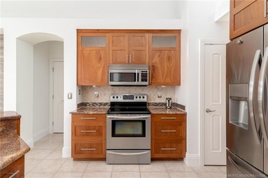 Ballantrae POOL Home with NEW ROOF and IMPACT WINDOWS and DOORS on Santa Lucia River Club in Florida - for sale on GolfHomes.com, golf home, golf lot