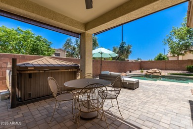 Nestled within the gated community of Seville, this beautifully on Seville Golf and Country Club in Arizona - for sale on GolfHomes.com, golf home, golf lot