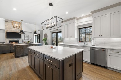 Designed from the ground up for exceptional entertaining and on Geneva National Golf Club in Wisconsin - for sale on GolfHomes.com, golf home, golf lot