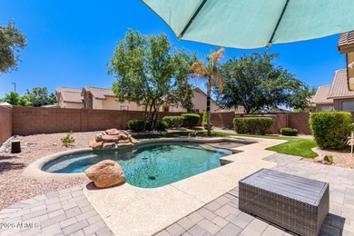 Nestled within the gated community of Seville, this beautifully on Seville Golf and Country Club in Arizona - for sale on GolfHomes.com, golf home, golf lot