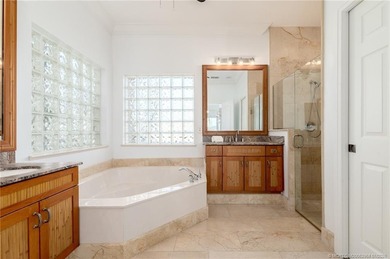 Ballantrae POOL Home with NEW ROOF and IMPACT WINDOWS and DOORS on Santa Lucia River Club in Florida - for sale on GolfHomes.com, golf home, golf lot