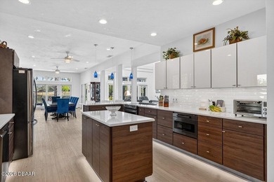 Stunning contemporary architecture frames the wide open interior on Plantation Bay Golf and Country Club in Florida - for sale on GolfHomes.com, golf home, golf lot