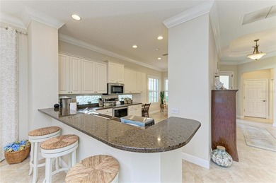 Come see this Beautiful maintenance-free Wexford home perfectly on Lakewood Ranch Golf and Country Club in Florida - for sale on GolfHomes.com, golf home, golf lot