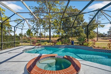 Stunning contemporary architecture frames the wide open interior on Plantation Bay Golf and Country Club in Florida - for sale on GolfHomes.com, golf home, golf lot