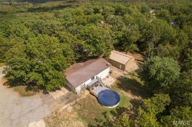 Nice Ranch home on 3 lots!  This is a 2 bedroom , 2 bath home on Terre Du Lac Golf and Country Club in Missouri - for sale on GolfHomes.com, golf home, golf lot