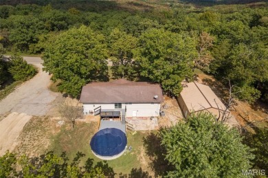 Nice Ranch home on 3 lots!  This is a 2 bedroom , 2 bath home on Terre Du Lac Golf and Country Club in Missouri - for sale on GolfHomes.com, golf home, golf lot