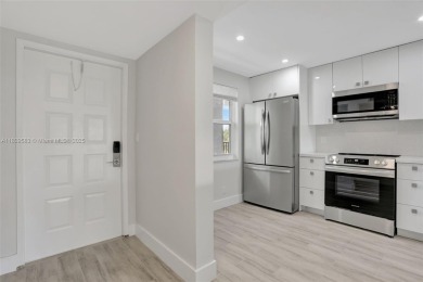 Fully renovated 2 bed/2 bath condo with additional room and on  in Florida - for sale on GolfHomes.com, golf home, golf lot