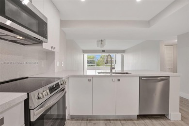 Fully renovated 2 bed/2 bath condo with additional room and on  in Florida - for sale on GolfHomes.com, golf home, golf lot