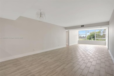 Fully renovated 2 bed/2 bath condo with additional room and on  in Florida - for sale on GolfHomes.com, golf home, golf lot