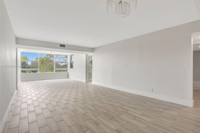 Fully renovated 2 bed/2 bath condo with additional room and on  in Florida - for sale on GolfHomes.com, golf home, golf lot