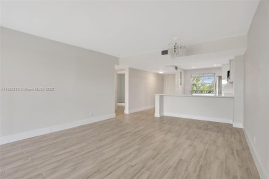 Fully renovated 2 bed/2 bath condo with additional room and on  in Florida - for sale on GolfHomes.com, golf home, golf lot