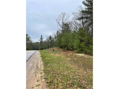 Nicely Wooded, Large Building Lot Located in a great location on Indian River Golf Club in Michigan - for sale on GolfHomes.com, golf home, golf lot