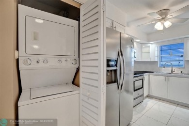 Move-in ready 2 bedroom condo in gated senior complex. Located on Inverrary Country Club in Florida - for sale on GolfHomes.com, golf home, golf lot