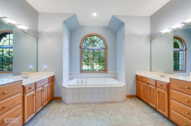 This exceptional ranch home combines timeless design with modern on Hughes Creek Golf Course in Illinois - for sale on GolfHomes.com, golf home, golf lot