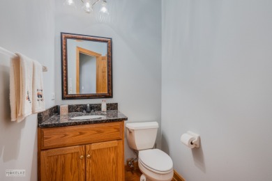 This exceptional ranch home combines timeless design with modern on Hughes Creek Golf Course in Illinois - for sale on GolfHomes.com, golf home, golf lot