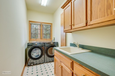 This exceptional ranch home combines timeless design with modern on Hughes Creek Golf Course in Illinois - for sale on GolfHomes.com, golf home, golf lot
