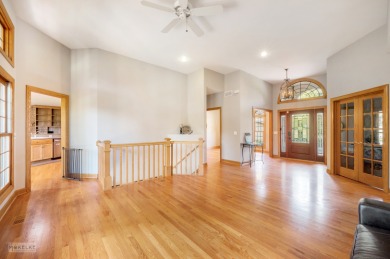 This exceptional ranch home combines timeless design with modern on Hughes Creek Golf Course in Illinois - for sale on GolfHomes.com, golf home, golf lot