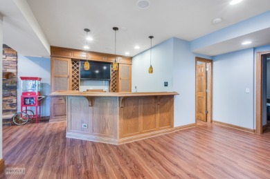 This exceptional ranch home combines timeless design with modern on Hughes Creek Golf Course in Illinois - for sale on GolfHomes.com, golf home, golf lot