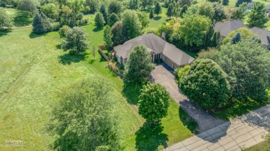 This exceptional ranch home combines timeless design with modern on Hughes Creek Golf Course in Illinois - for sale on GolfHomes.com, golf home, golf lot