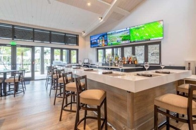 This delightful home has many updates as well as an exclusive on Old Marsh Golf Club in Florida - for sale on GolfHomes.com, golf home, golf lot