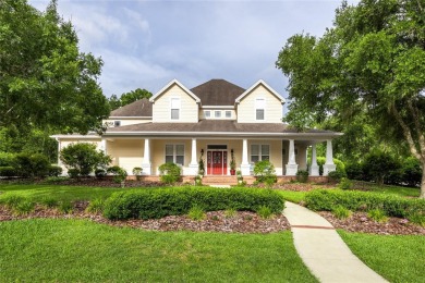 Come enjoy the cool breeze blowing across the front porch of on Haile Plantation Golf and Country Club in Florida - for sale on GolfHomes.com, golf home, golf lot