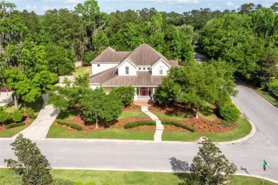 Come enjoy the cool breeze blowing across the front porch of on Haile Plantation Golf and Country Club in Florida - for sale on GolfHomes.com, golf home, golf lot