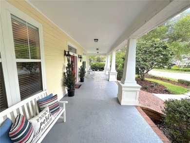 Come enjoy the cool breeze blowing across the front porch of on Haile Plantation Golf and Country Club in Florida - for sale on GolfHomes.com, golf home, golf lot