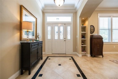 Come enjoy the cool breeze blowing across the front porch of on Haile Plantation Golf and Country Club in Florida - for sale on GolfHomes.com, golf home, golf lot
