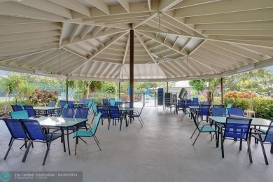 Move-in ready 2 bedroom condo in gated senior complex. Located on Inverrary Country Club in Florida - for sale on GolfHomes.com, golf home, golf lot