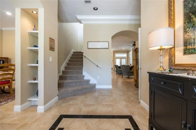 Come enjoy the cool breeze blowing across the front porch of on Haile Plantation Golf and Country Club in Florida - for sale on GolfHomes.com, golf home, golf lot
