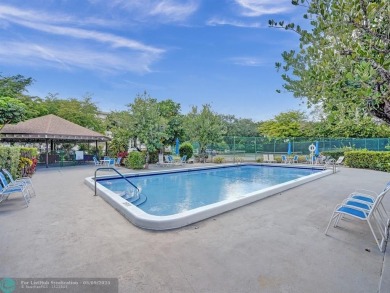 Move-in ready 2 bedroom condo in gated senior complex. Located on Inverrary Country Club in Florida - for sale on GolfHomes.com, golf home, golf lot