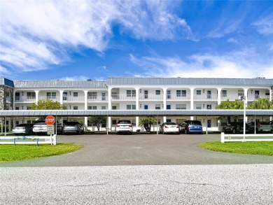 Turnkey completely furnished. Take the elevator or stairs to on Zephyrhills Municipal Golf Course in Florida - for sale on GolfHomes.com, golf home, golf lot