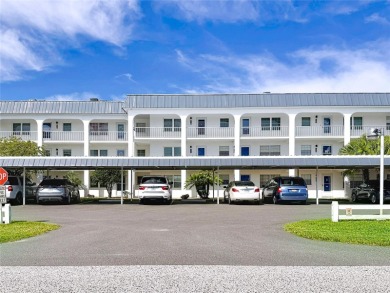 Turnkey completely furnished. Take the elevator or stairs to on Zephyrhills Municipal Golf Course in Florida - for sale on GolfHomes.com, golf home, golf lot