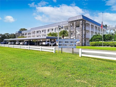 Turnkey completely furnished. Take the elevator or stairs to on Zephyrhills Municipal Golf Course in Florida - for sale on GolfHomes.com, golf home, golf lot