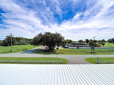 Turnkey completely furnished. Take the elevator or stairs to on Zephyrhills Municipal Golf Course in Florida - for sale on GolfHomes.com, golf home, golf lot
