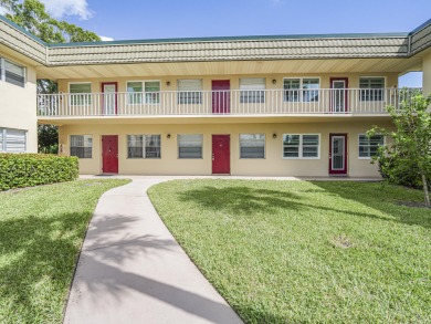 Spacious first floor condominium  in vibrant 55+ community- on Vero Beach South Golf Course in Florida - for sale on GolfHomes.com, golf home, golf lot