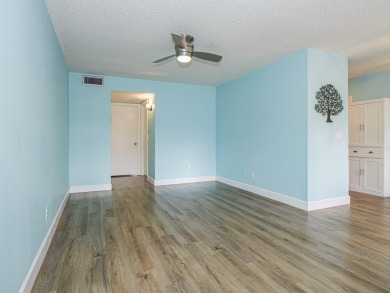 Spacious first floor condominium  in vibrant 55+ community- on Vero Beach South Golf Course in Florida - for sale on GolfHomes.com, golf home, golf lot